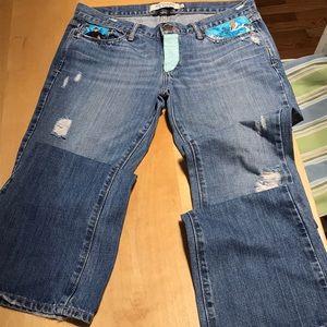 Disney’s Frozen hand embellished book cut jeans.